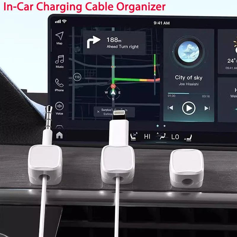 White magnetic cable clips organizing charging cables in a car